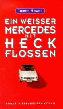 Ein weißer Mercedes mit Heckflossen