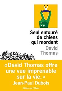 Seul entouré de chiens qui mordent