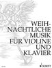 Weihnachtliche Musik: Violine und Klavier.