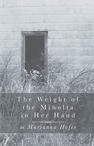 The Weight of the Minolta in Her Hand