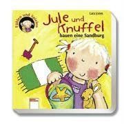 Jule und Knuffel bauen eine Sandburg. Fühlen und Spielen